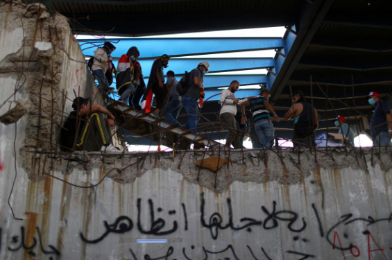 ساختمان توخالی مقر معترضان عراق (+عکس) ساختمان توخالی مقر معترضان عراق (+عکس)