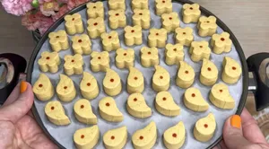 طرز تهیه شیرینی نخودچی خانگی بدون فر و همزن